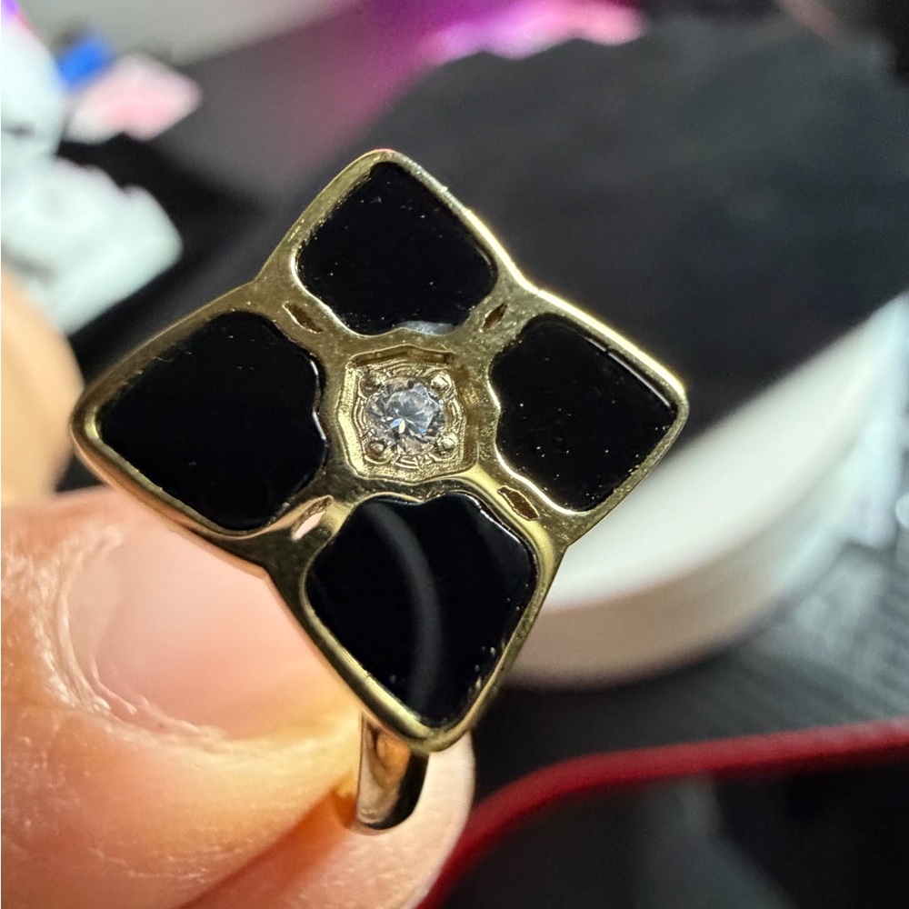 Gold-Tone Black Enamel Flower Ring with Center Crystal